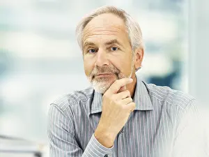 Pensive Portrait Photo Prints: Senior, friendly, concentrating expression