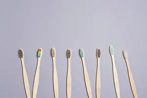 Bamboo Toothbrushes Prints: Set of bamboo toothbrushes. Copyspace