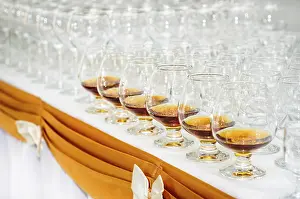 Whisky And Liquor Display Prints: Set of brandy glasses at buffet table