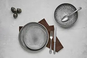 Sterling Silver Cutlery Set Prints: Set of grey ceramic plates and tableware