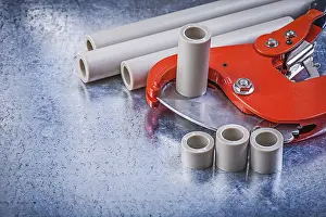 Metal Background Studio Shot Prints: Set of pipe coupling tools on metallic background construction concept