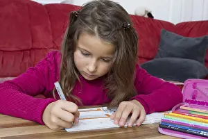 Primary School Homework Prints: Seven-year-old does schoolwork