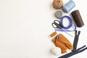 Flat Lay Studio Shot Prints: Sewing accessories: scissors, thread
