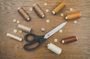 Sewing Concept Prints: Sewing concept. Scissors, threads and buttons