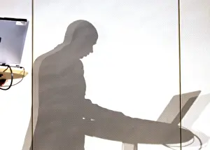 Businessman With Laptop Prints: Shadow of manager with laptop