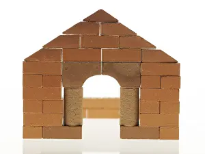 Construction Site Images Prints: Shell of a house with a brick facade