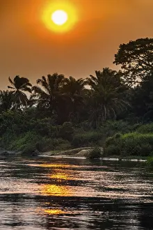 Deserted Riverbank Scene Prints: Sidearm of the Congo river at sunset, DR Congo