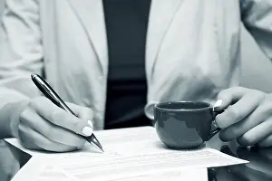 Female Manager At Work Prints: Signing contract