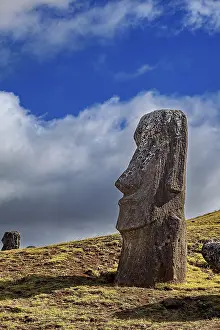 Blue Sky Landscapes Prints: A single moai against a blue sky with clouds on Easter Island