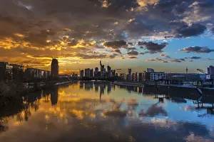 Cloudy Evening Skies Prints: Skyline with cloudy sky at sunset