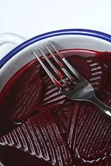 Beetroot Nutrition Facts Prints: Sliced pickled beetroot with peel and fork