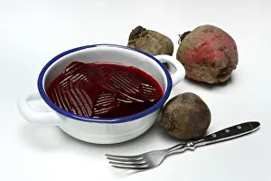 Leafy Green Vegetables Prints: Sliced pickled beetroot with peel and fork