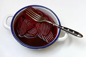 Leafy Greens Prints: Sliced pickled beetroot with peel and fork
