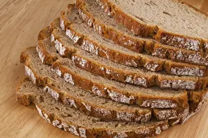 Balanced Diet Meals Prints: Several slices of dark bread lying next to each other