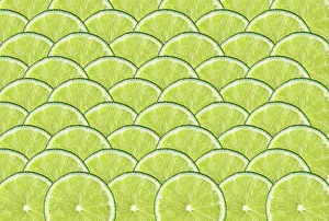 Citrus Fruit Mosaic Art Prints: Many slices of lime as a background
