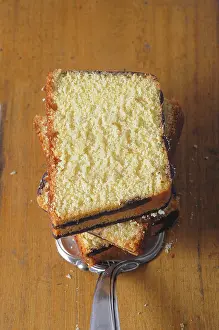 Pastry Still Life Prints: Slices of ring cake on a cake server