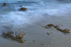 European Beaches Prints: Soft waves breaking on a beach