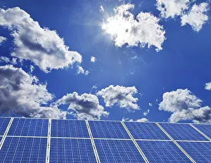 Alternative Energy Source Prints: Solar system in front of a blue sky with clouds