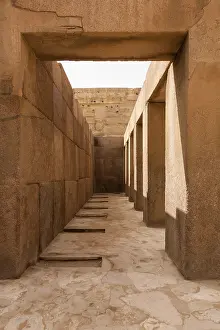 Stone Column Architecture Prints: Solid stone columns and pillars underneath the statue of the Sphinx by Pyramids of Giza in Cairo Egypt