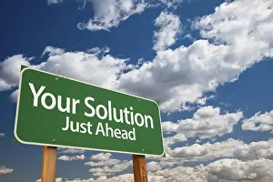 Symbolic Picture Success Prints: Your solution green road sign over dramatic clouds and sky