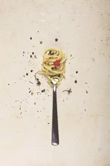 Seafood Spaghetti Dish Prints: Spaghetti strung on a fork, on the table