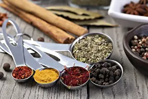 Orange Colored Spices Prints: spices set isolated on a table