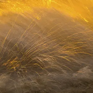 Evening Atmosphere UK Prints: Spray, waves on the beach, sunset