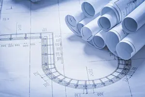 Blueprint Rolls Concept Prints: Stack of blueprint rolls construction concept