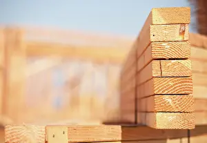 Wooden Plank Texture Prints: Stack of Building Lumber at Construction Site with Narrow Depth of Field