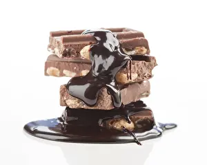 Gourmet Dessert Prints: A stack of chocolate bars with almonds drizzled in rich