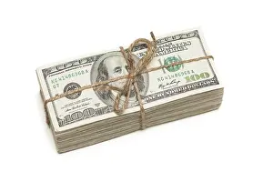 White Background Currency Prints: Stack of one hundred dollar bills tied in a burlap string isolated on a white background