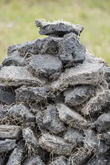 Deserted Scottish Landscapes Prints: Stack of extracted peat from the Scottish Highland moors