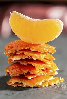 Citrus Fruit Nutrition Facts Prints: Stack of mandarin peel and a tangerine on top