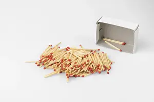 Bright White Background Prints: Stack of matches in front of almost empty box