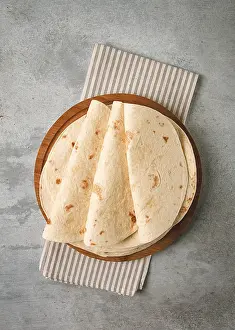 Food Photography Detail Prints: A stack of Mexican tortillas, on a gray table