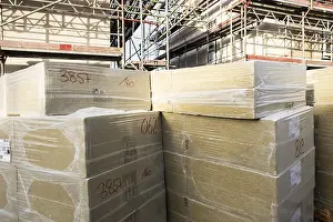 Energy Saving Construction Prints: A stack of mineral wool insulation boards on a construction site