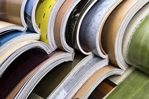 Deserted Library Prints: Stack of open magazines