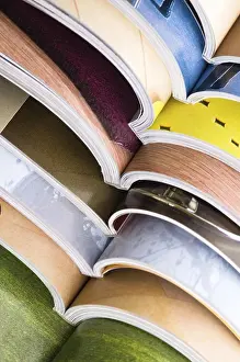 Deserted Library Prints: Stack of open magazines