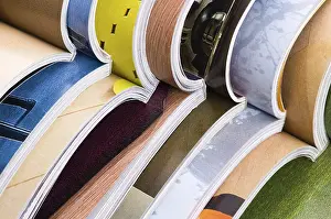 Deserted Library Prints: Stack of open magazines