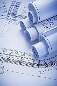 Rolled Up Papers Prints: Stack of rolls blueprints close up