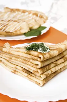 White Plate Desserts Prints: A stack of russian pancakes on a white plate