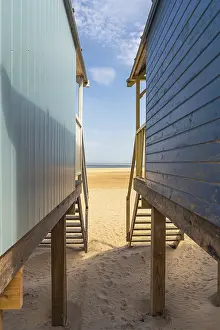 Prints of Standing between two Beach Huts in Wells-next-the-Sea, Norfolk, England, UK Well Prints: Wells-next-the-Sea Beach Huts Print, Norfolk, England