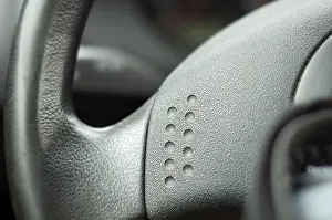 Deserted Road Traffic Prints: Steering wheel very close up