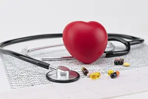 Healthcare System Icon Prints: Stethoscope on electrocardiogram