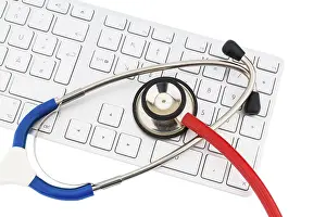Healthcare Concept Picture Prints: Stethoscope and keyboard of a computer