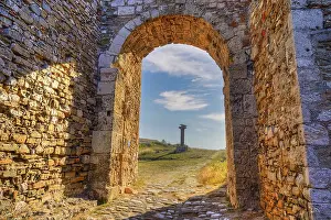 Deserted Castle Fortification Prints: Stone arch with view of a path and ancient column in the background