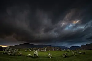 British National Park Landscapes Prints: Stone circle with dramatic dark cloud sky