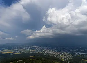 Prints of Storm clouds over city and forest, Jizera Mountains, Liberec, Czech Republic Liberec Prints: Storm Clouds over City and Forest Print, Liberec, Czech Republic