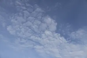 Stratocumulus Cloud Formation Prints: Stratocumulus white clouds in a blue sky