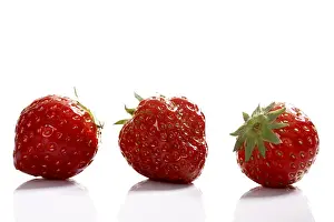 Vitamin Rich Berries Prints: Three strawberries